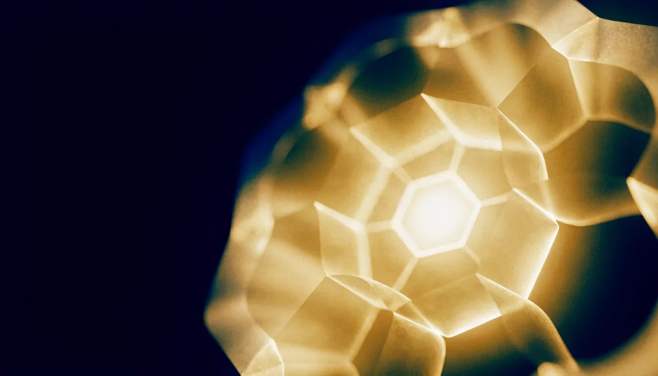 A warm brass-gold hexagonal lattice of light